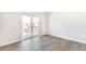 Bright dining area with sliding glass door leading to outdoor patio space at 27534 E Byers Ave, Aurora, CO 80018