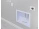 Clean utility hookups with visible pipe, electrical box and outlets at 27534 E Byers Ave, Aurora, CO 80018