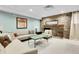 Comfortable lounge area with stone fireplace and seating at 2 Adams St # 901, Denver, CO 80206