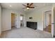 Spacious bedroom featuring ceiling fan, and easy access to ensuite bathroom at 3769 Dahlia St, Denver, CO 80207