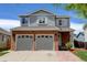 Charming home with a two-car garage and well-manicured front yard, offering curb appeal at 3769 Dahlia St, Denver, CO 80207