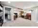Spacious basement with laundry area, carpeted flooring, and plenty of storage for your convenience at 794 S Ivy St, Denver, CO 80224