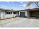 Charming single Gathering home featuring a brick exterior, attached garage and a well-manicured front yard at 794 S Ivy St, Denver, CO 80224