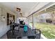 Expansive covered patio showcasing outdoor dining and lounge areas, ideal for enjoying the backyard view at 794 S Ivy St, Denver, CO 80224