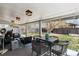 Charming covered patio featuring an outdoor dining area and comfortable seating, perfect for entertaining at 794 S Ivy St, Denver, CO 80224