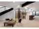 Finished basement with a custom wine cellar, bar area, and cozy seating, ideal for entertaining and relaxation at 5032 Nile Ct, Golden, CO 80403