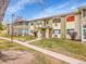 The apartment complex is surrounded by green lawns and mature trees, offering a tranquil living environment at 725 S Clinton St # 1B, Denver, CO 80247