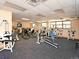 Community fitness center with treadmills, weights and exercise machines for residents at 725 S Clinton St # 1B, Denver, CO 80247