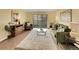Cozy living room with sliding door, natural light, and neutral decor, creating a welcoming and relaxing space at 725 S Clinton St # 1B, Denver, CO 80247