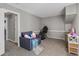 Cozy bedroom with gray walls and carpet flooring at 1379 S Idalia St # C, Aurora, CO 80017