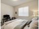 Cozy bedroom with a calming atmosphere and neutral color scheme at 6950 Hidden Cove Ct, Castle Pines, CO 80108
