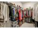 Walk in closet featuring ample hanging space and storage at 6950 Hidden Cove Ct, Castle Pines, CO 80108
