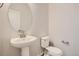 Elegant half-bath with a modern vanity, stylish fixtures, and contemporary design at 1300 Loraine N Cir, Lafayette, CO 80026
