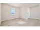 Inviting living room with natural light, neutral paint, and stylish flooring at 1300 Loraine N Cir, Lafayette, CO 80026