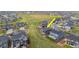 Aerial view highlighting location of the property and showing the landscaping at 1677 Meagan Way, Erie, CO 80516