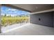 View from the covered patio, showcasing the landscaping, outdoor space and open backyard at 1677 Meagan Way, Erie, CO 80516
