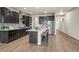Spacious kitchen with island, stainless steel appliances, and an open floor plan at 1677 Meagan Way, Erie, CO 80516