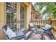 Cozy balcony featuring stylish outdoor furniture, ideal for enjoying the fresh air and city views at 1950 N Logan St # 108, Denver, CO 80203