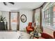 Bright bedroom featuring large windows, neutral decor, and ample natural light at 1950 N Logan St # 108, Denver, CO 80203