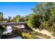 Scenic view of a bridge over a river with lush greenery at 525 Jackson St # 303, Denver, CO 80206