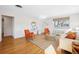 Comfortable living room featuring hardwood floors, ample seating, and bright natural light at 525 Jackson St # 303, Denver, CO 80206