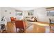 Spacious living room with hardwood floors, bright windows, and comfortable furnishings at 525 Jackson St # 303, Denver, CO 80206