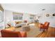 Inviting living room with hardwood floors, modern furniture, and lots of natural light at 525 Jackson St # 303, Denver, CO 80206