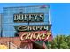 Exterior of Duffy's Cherry Cricket restaurant with iconic sign at 525 Jackson St # 303, Denver, CO 80206