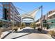 Charming Cherry Creek North entrance with brick-paved streets and modern architecture at 525 Jackson St # 303, Denver, CO 80206