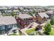 Aerial view of a two-story home with a well-maintained backyard in a neighborhood at 172 Painted Horse Way, Erie, CO 80516