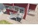 View of outdoor deck from above, with stairs down to a stone and grassy yard at 172 Painted Horse Way, Erie, CO 80516