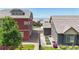 Two-story home with clean landscaping at 172 Painted Horse Way, Erie, CO 80516