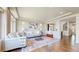 Spacious living room boasting hardwood floors, recessed lighting, and comfortable seating at 172 Painted Horse Way, Erie, CO 80516