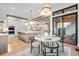 Spacious kitchen with an island, breakfast nook and modern appliances at 6531 S Harlan Ct, Littleton, CO 80123