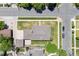 Aerial view of the home on a landscaped corner lot at 2501 E Arkansas Ave, Denver, CO 80210