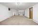 Large finished basement with plush carpeting, multiple doors, and plenty of potential at 2501 E Arkansas Ave, Denver, CO 80210