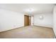 This bedroom features carpet floors, neutral walls, and natural lighting at 2501 E Arkansas Ave, Denver, CO 80210