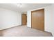This bedroom features carpet floors, neutral walls, and closet at 2501 E Arkansas Ave, Denver, CO 80210