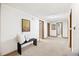 Hallway area featuring neutral carpeting, fresh paint, and access to rooms at 2501 E Arkansas Ave, Denver, CO 80210