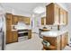 Bright kitchen with stainless steel appliances, ample cabinet space and white countertops at 2501 E Arkansas Ave, Denver, CO 80210