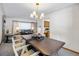 Open concept living room and dining room with modern decor and plenty of natural light at 2501 E Arkansas Ave, Denver, CO 80210