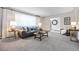 Comfortable living room with neutral tones, stylish furniture, and ample space at 2501 E Arkansas Ave, Denver, CO 80210