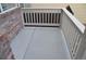 Outdoor patio with a fenced railing, perfect for entertaining guests or enjoying a quiet evening outdoors at 6123 S Quemoy Way, Aurora, CO 80015