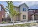 Charming two-story home featuring a covered front porch and modern design elements at 858 Promenade Dr, Superior, CO 80027