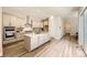 Modern kitchen featuring stainless steel appliances, center island, and ample cabinet space at 858 Promenade Dr, Superior, CO 80027