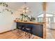 Living room wet bar with a view of the backyard at 2780 S Oakland W Cir, Aurora, CO 80014
