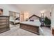 Bright and spacious main bedroom with sliding glass door and ensuite bathroom at 2780 S Oakland W Cir, Aurora, CO 80014