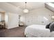 Bright and airy bedroom with neutral tones, ample closet space, and comfortable furnishings for relaxation at 50 S Eudora St, Denver, CO 80246