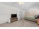 Bright bedroom featuring neutral walls, carpeting, ceiling fans, and closet with louvered doors at 12543 W Alameda Dr, Lakewood, CO 80228