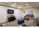 Finished basement with seating area at 1021 Neptunite Pl, Castle Rock, CO 80108